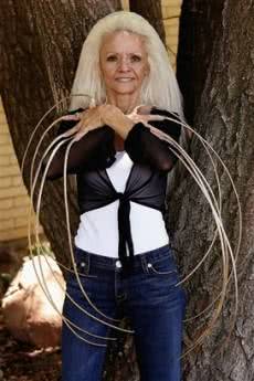 Lee Redmond shows off her fingernails in Salt Lake City, Aug. 8, 2006.